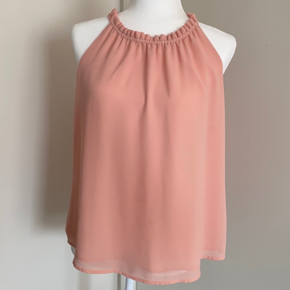 Never worn DL top